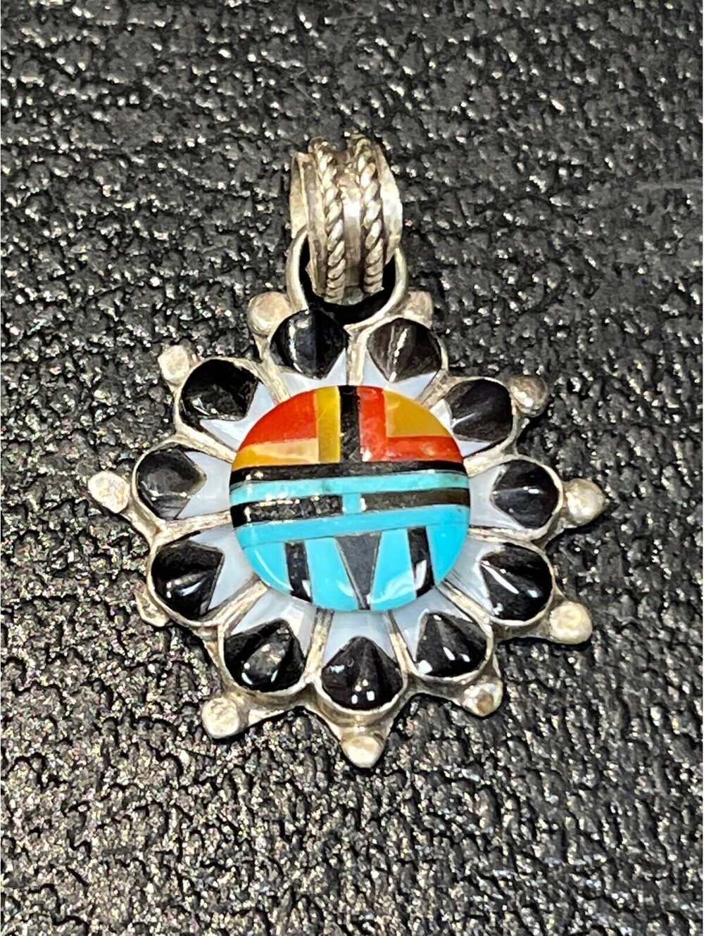 Native American Zuni handmade sterling silver turquoise inlay sun face pendant